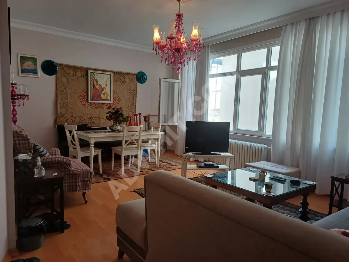 APPARTEMENT 1+1 À VENDRE À CİHANGİR - 60 M² NET AVEC CUISINE FERMÉE image 2